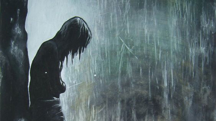 Người phụ nữ dưới cơn mưa